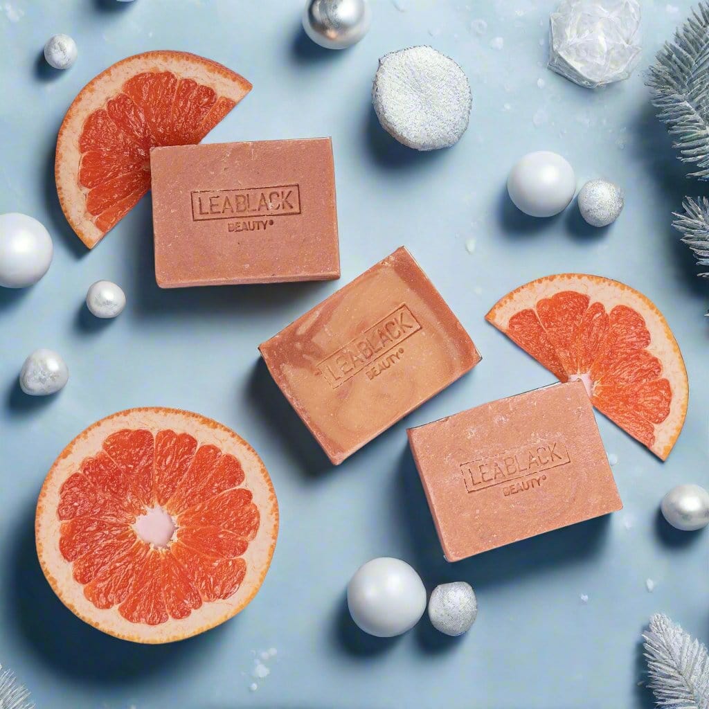 Three Beauty Bars and slices of pink grapefruit